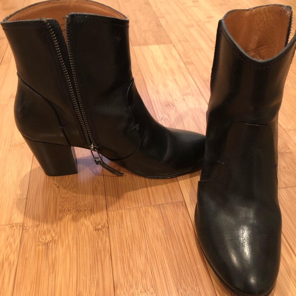 Black leather ankle booties.